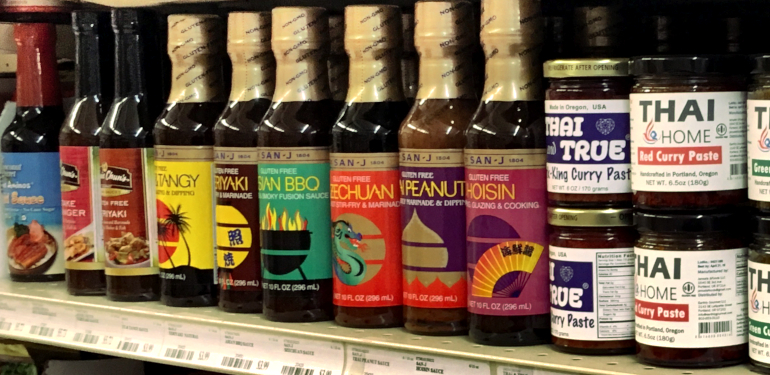 a variety of cooking sauces and curry paste
